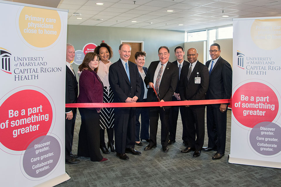 UMB President Jay A. Perman, MD, Leads the Ribbon Cutting Ceremony at the New Clinic