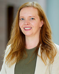 Portrait of Emily Heil indoors.