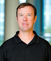 Portrait of Keith Freel indoors.