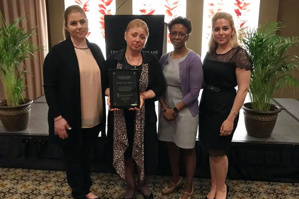 The Family of Huseyin Tunc is Pictured with Dean Natalie D. Eddington, PhD, FCP, FAAPS