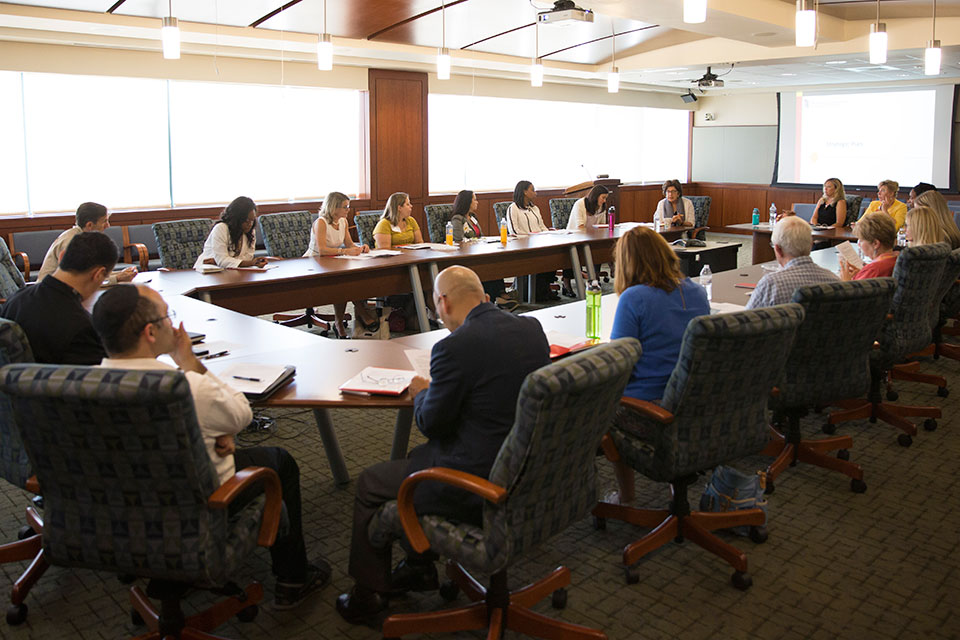 Lamy Champions Gather with Faculty and Staff in the President's Boardroom