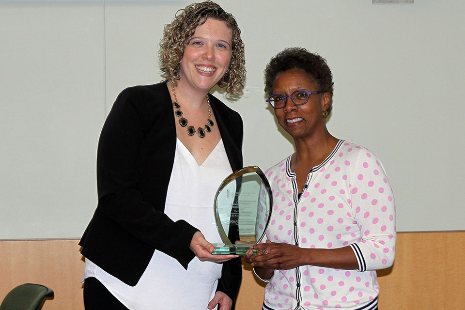 Dr. Meghan Swarthout poses for photo with Dean Natalie D. Eddington.