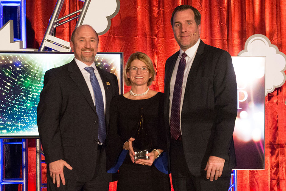 Dr. Nicole Brandt poses for photo with ASCP leadership after receiving the George F. Archambault Award.