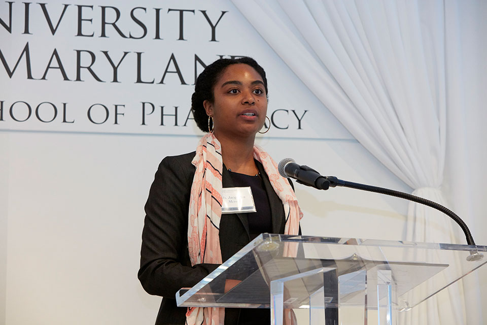Graduate student Jacqueline McRae delivers remarks to attendees.