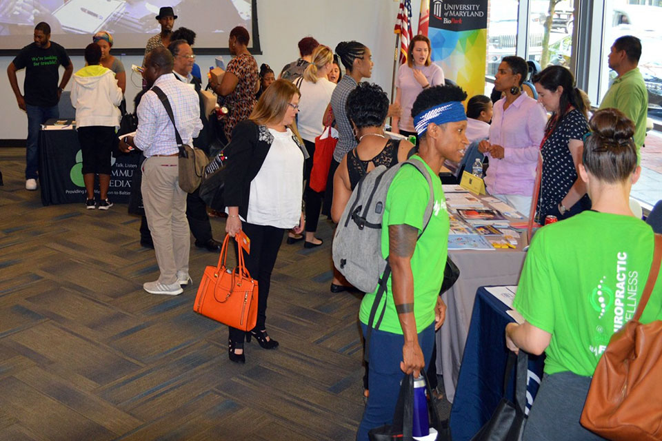 Community members explore the PATIENTS Day health fair.