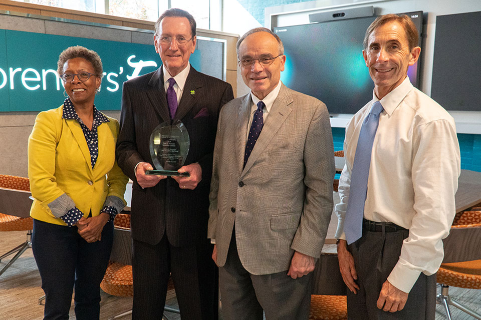 Dr. Calvin Knowlton poses for photo with Drs. Natalie Eddington, Frank Palumbo, and C. Daniel Mullins.