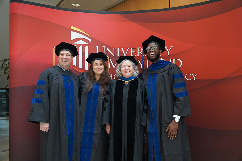 PhD students pose with Dr. Angela Wilks