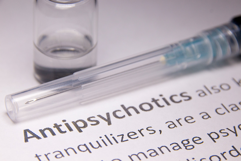 Stock image with a focus on the word antipsychotics.