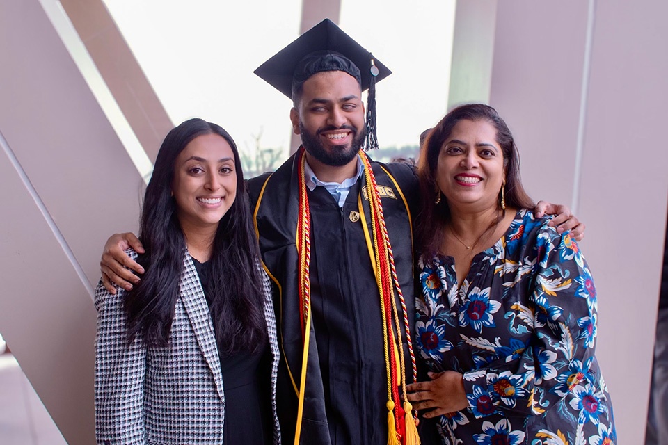 Alena Abraham, PharmD ’24, her brother, Shawn Abraham and their mother, Sherly Abraham.