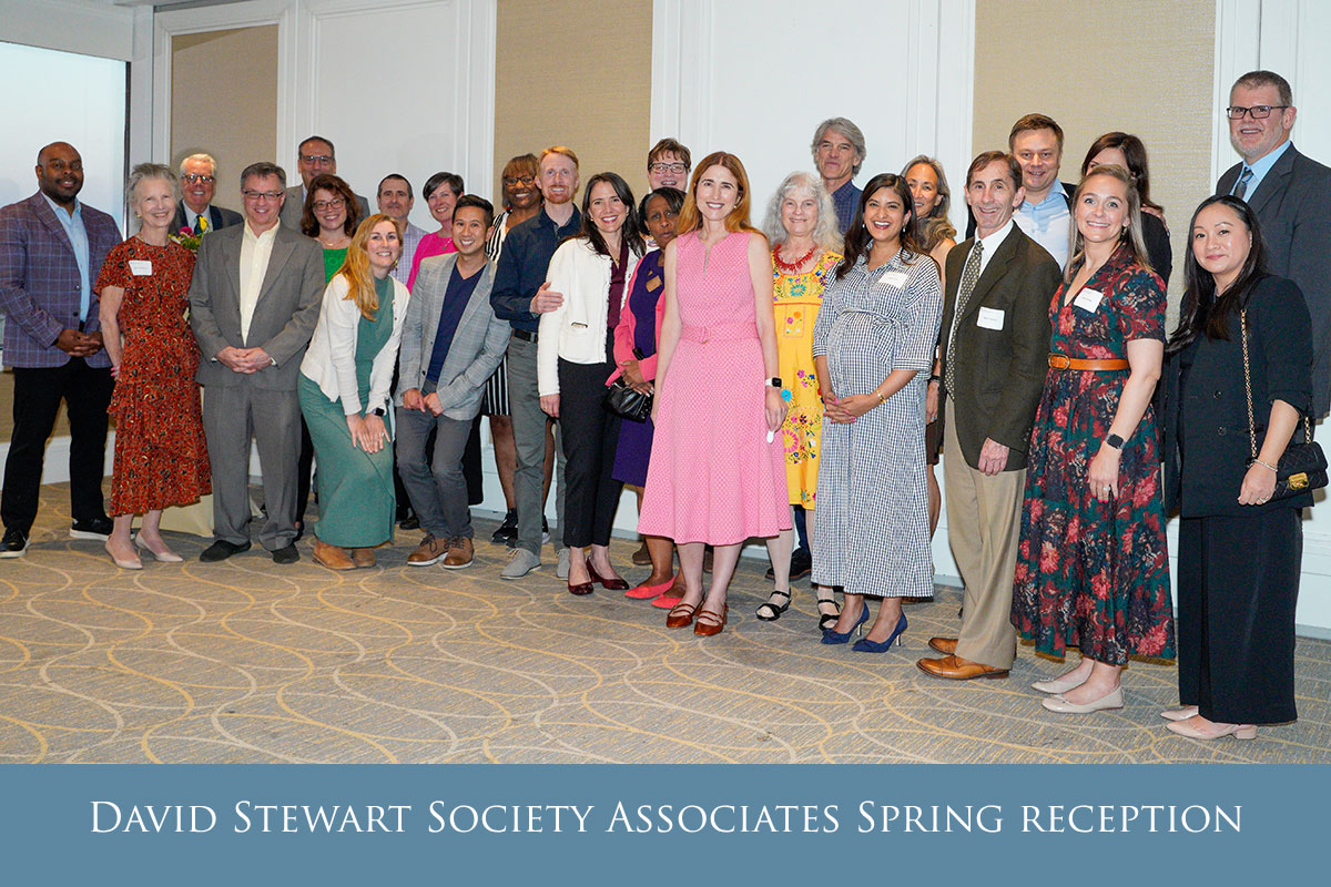 Members of the School of Pharmacy community stand together for a group photo at the David Stewart Associates Society spring reception.